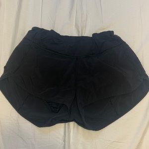 LULU LEMON SIZE 4 BLACK SHORTS